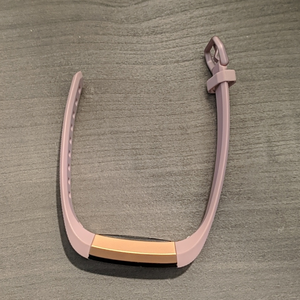 Fitbit watch with blush pink strapes